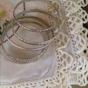 Silver toned bangle bracelets